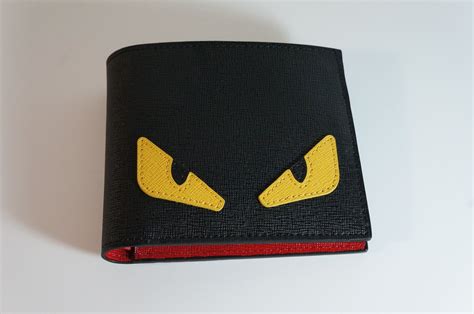 storm wallet monster eyes